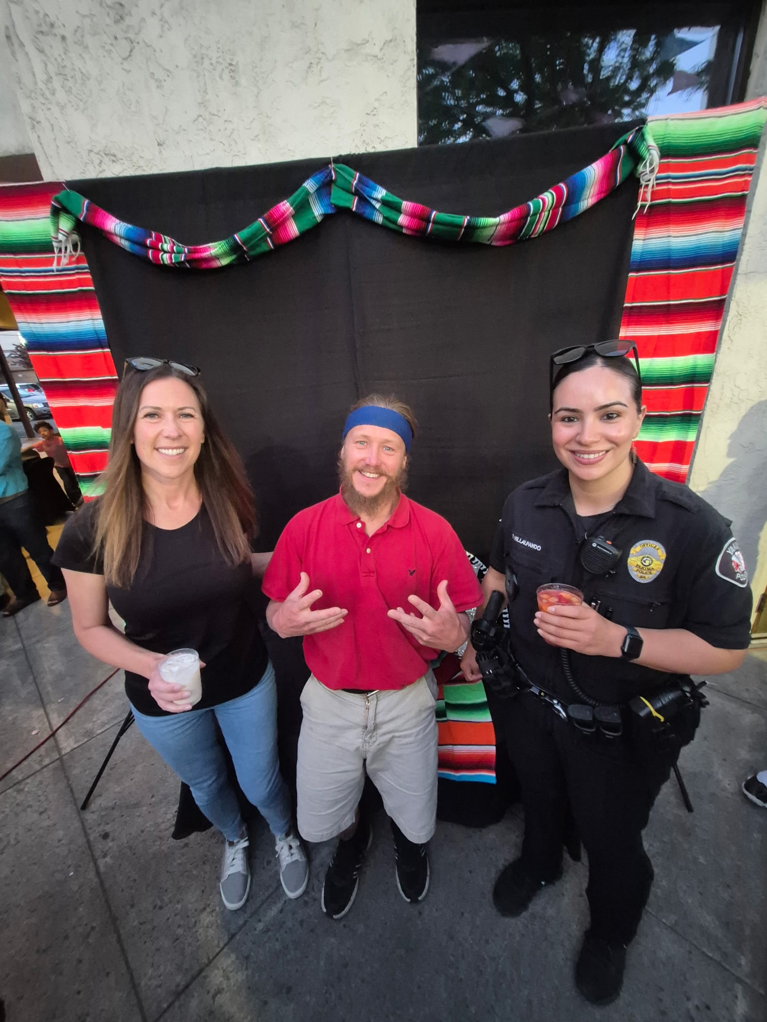 William "Will" Chichenoff standing with community members at a local event